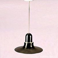 Photo of the light fixture hung and visible fully with pale brass anodized aluminum exterior and white interior flat wide shade.