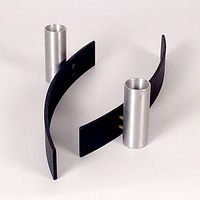 Pair of brushed aluminum postmodern candle holders attached to curved matte black steel bases with small brass connectors, shown on white background.