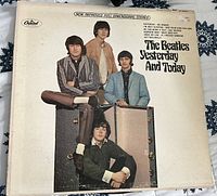 Front cover of The Beatles "Yesterday and Today" original 1966 LP, showing band members and album title.