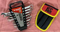 Husky 8-piece combination wrench set in rack with clear size markings from 1/4" to 3/4".