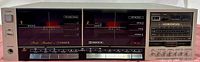 Full front view showing dual cassette decks, control buttons, and radio tuner panel.