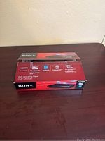 Box for the Sony DVD upscaling player showing HDMI and 1080p upscaling features.