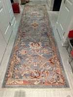 Full-length view of the runner laid in hallway