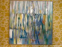 Full front view of painting showing abstract vertical drips and silvered frame