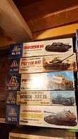 Five Italeri 1:35 scale military vehicle model kits stacked, boxes unopened and in good condition