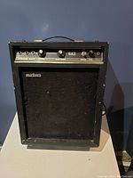 Front view of Marlboro GA2 amplifier showing control knobs, input jacks, and speaker grill