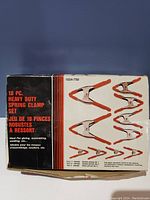 Box showing the packaging of the 10-piece heavy duty spring clamp set with illustrations of different clamp sizes included.