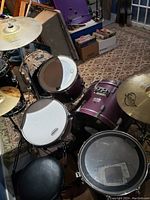 Overall assembled drum kit showing shells, cymbals and throne