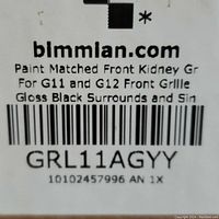 Label stating paint matched front kidney grille for G11 and G12 with gloss black surrounds from bimmian.com