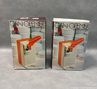 Box and instruction manual for Black Gnat battery operated electric can opener, showing packaging and branding.