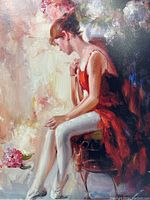 Close-up of the canvas print showing detailed brush strokes and colors of the woman in red dress.