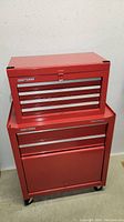 Red Craftsman top chest positioned on red rolling cabinet