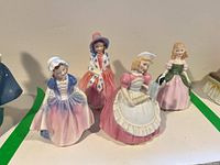 Four figurines side by side – full lot overview