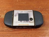 Black presentation box of Canadian 2000 Polar Bear Millennial Edition with visible price sticker of $19.99