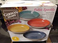 Box showing Gibson Home Color Speckle Salad Bowl Set, four pieces, each 8 inches across