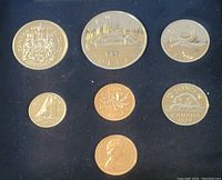 Photo of seven uncirculated Canadian coins dated 1978 in protective packaging, showing detailed obverse and reverse designs.