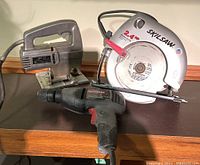 Photo showing all three tools - Skilsaw circular saw, Custom Craft jigsaw, Sears Craftsman drill