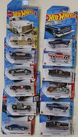 Front view of all 12 Hot Wheels cars in package, showing various colors and designs.