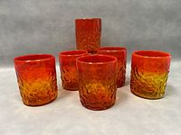 Set of six amberina lowball glasses with textured flame pattern in amber to orange-red gradient