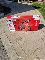 Sealed retail box for a 16 inch kids bike with Logo branding and image of the bike on the box.