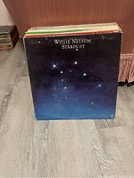 Front view of vinyl record collection with Willie Nelson Stardust album shown prominently