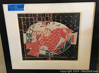 Framed block print artwork titled 'Snapper au Citron' showing a stylized fish with geometric patterns, signed by artist and numbered 1/18 edition. Artwork measures 27 inches wide by 32 inches tall.