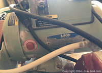 Close-up of MK Diamond motor label and wiring showing model details, motor cooling instructions and wiring connections.