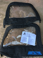 Fabric replacement windows for Jeep Wrangler (1997-2002) model, laid flat on surface with Bestop installation instructions included.