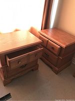 Front view of both bedside tables side by side