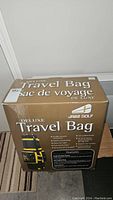 Box of Deluxe Travel Bag showing brand and product name.