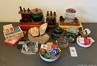 Overall lot showing pipes, stands, jars, ashtrays, match safe and matchbook collection