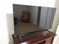 Front view of TV on stand