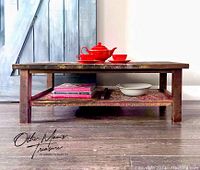 Front view showing entire table, top surface, legs, and lower shelf