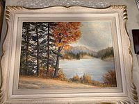 Frontal view of the framed oil painting showing the lake scene with autumn trees and visible signature W. Allan in the lower left.