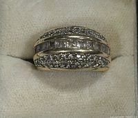 Top view showing central row of channel-set baguette diamonds with pavé round diamonds above and below