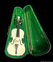 Vintage white-finished viola inside green velvet-lined case with bow secured alongside.