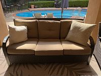 Front view of sofa showing cushions and decorative pillows