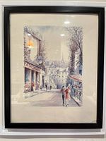 Framed signed lithograph of Paris street scene with Eiffel Tower and couple walking near 'Patachou' cafe, showing overall artwork and frame