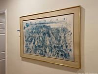 Full view of the framed abstract print on a wall.