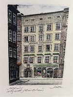 Close-up photo of the etching showing Mozart's House in Salzburg with artist signature and handwritten notes