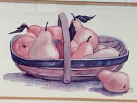 Close-up of the print showing a basket filled with pears and artist signature.