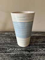 Photo showing front exterior of tall ceramic vase with blue and green linear decoration from IKEA.