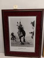 Framed black and white Seabiscuit racing poster, close view of entire artwork and frame.