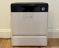 Front view of Oransi air purifier showing overall design and condition