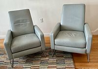 Front view of both Flight Recliners showing overall shape and pair configuration