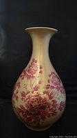 Front view showing entire vase with floral design