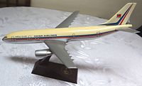 Side view of full airplane model with China Airlines livery and stand.