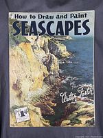 Front cover of vintage instructional art book showing a painted rocky seascape and ocean with title text.