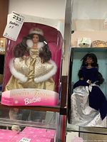 Winter Fantasy Barbie doll in original box with gold and cream gown with white fur details.