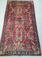 Top view of the Kashmar Persian rug showing full pattern and border.